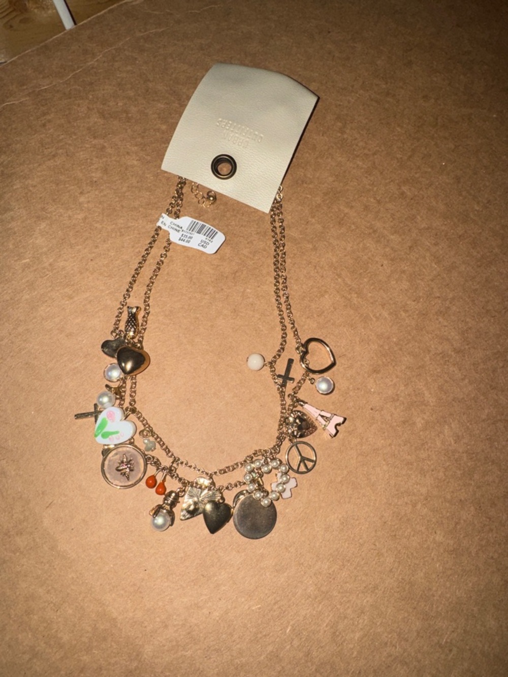 Gold-Tone Multi Charm Necklace with Hearts, Pearls & Symbols